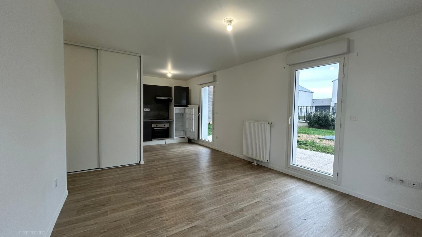 A LOUER T2 SARAN REZ DE JARDIN — photo 6