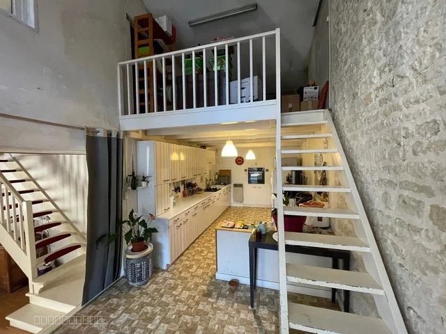 IMMEUBLE AVEC MAISON D'HABITATION ET 2 LOCAUX COMMERCIAUX — photo 4