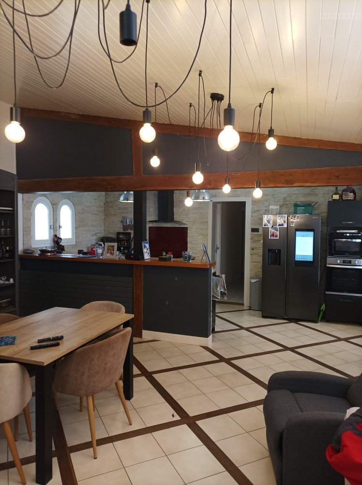 Venez découvrir cette agréable maison semi-enterré sur un jolie terrain arboré de 2400 m2 avec un puit — photo 3