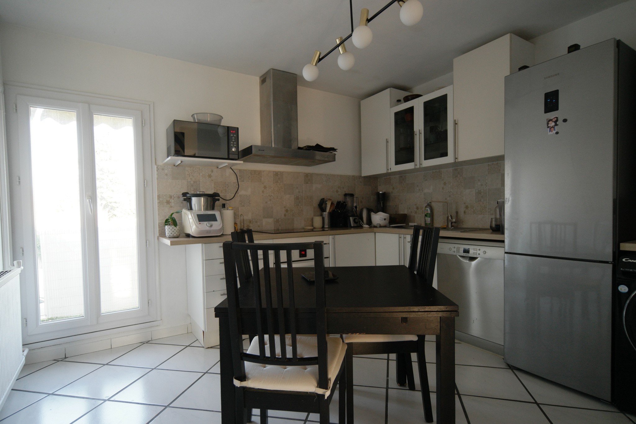 Maison de type 4 en triplex avec jardinet et garage — photo 4