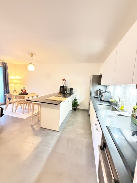 EXCLU : T3 71m2 AVEC BALCON et GARAGE DOUBLE EN SS SOL  01630 ST GENIS POUILLY — photo 6
