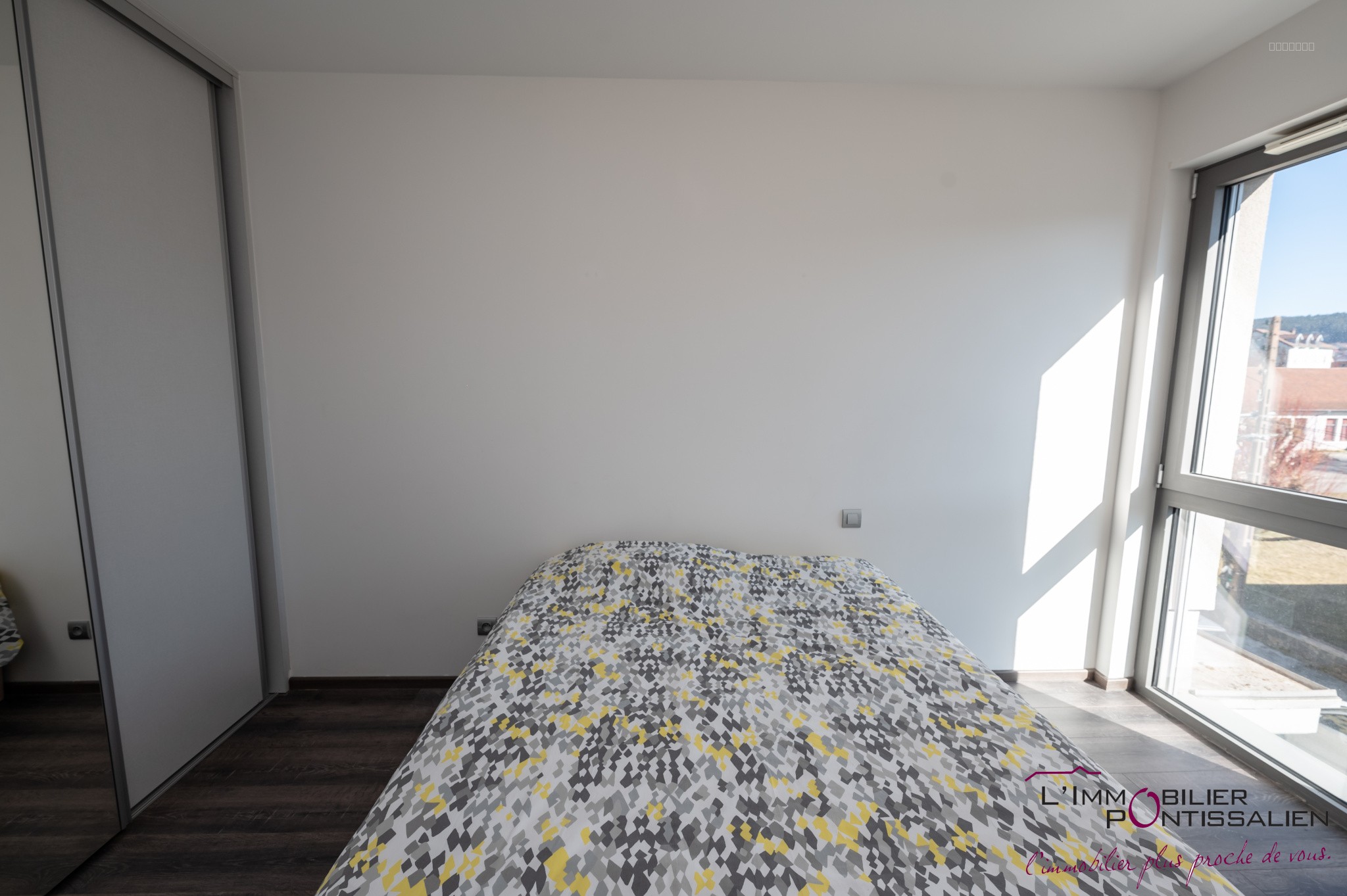 PONTARLIER - PROCHE CENTRE VILLE : APPARTEMENT RECENT DE TYPE 2 AVEC ASCENSEUR, CAVE, GARAGE ET TERRASSE — photo 17