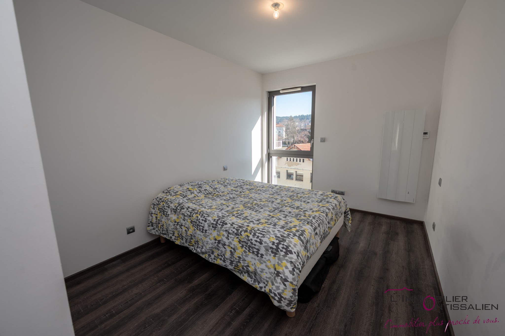 PONTARLIER - PROCHE CENTRE VILLE : APPARTEMENT RECENT DE TYPE 2 AVEC ASCENSEUR, CAVE, GARAGE ET TERRASSE — photo 4