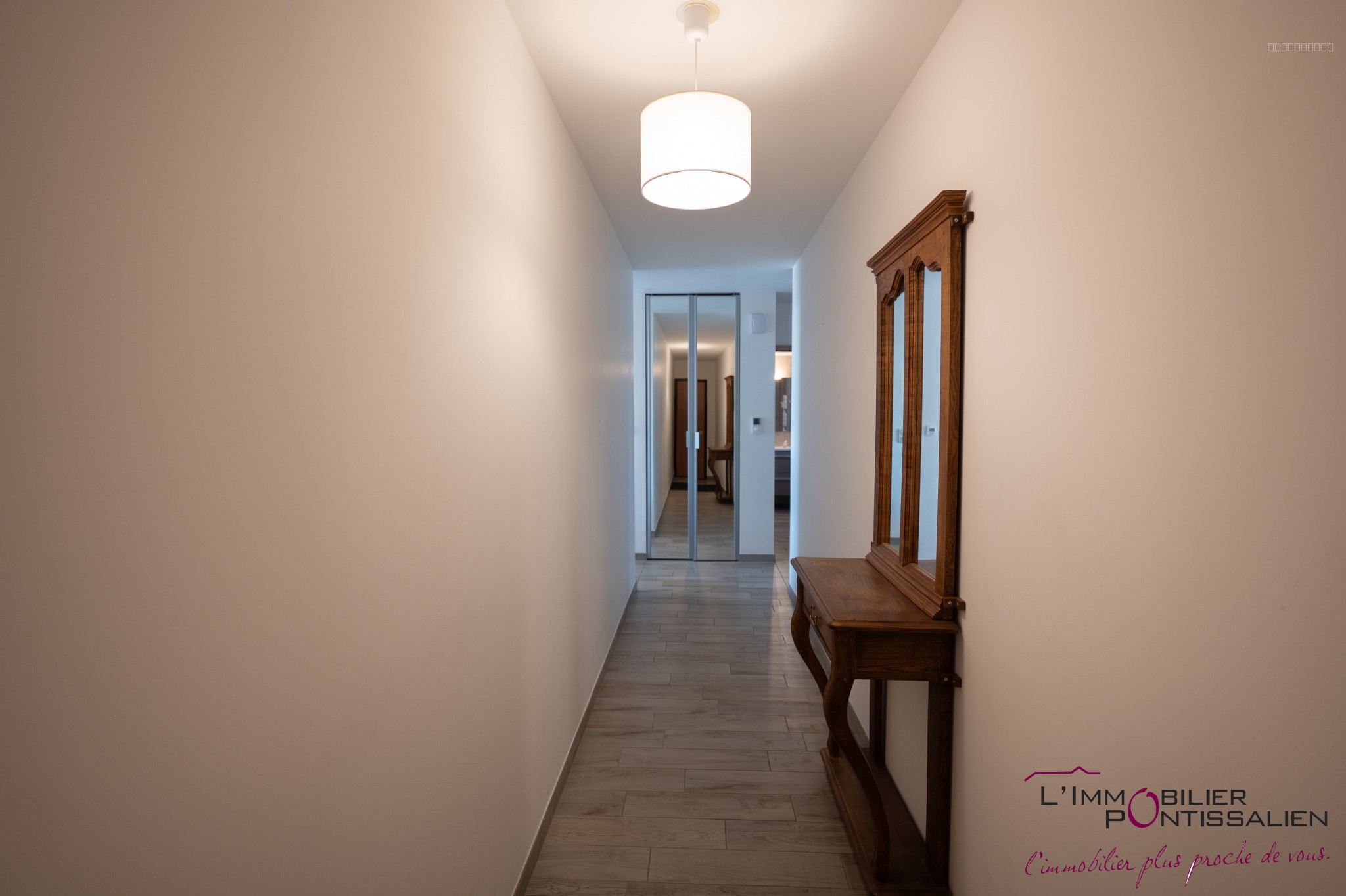 PONTARLIER - PROCHE CENTRE VILLE : APPARTEMENT RECENT DE TYPE 2 AVEC ASCENSEUR, CAVE, GARAGE ET TERRASSE — photo 19