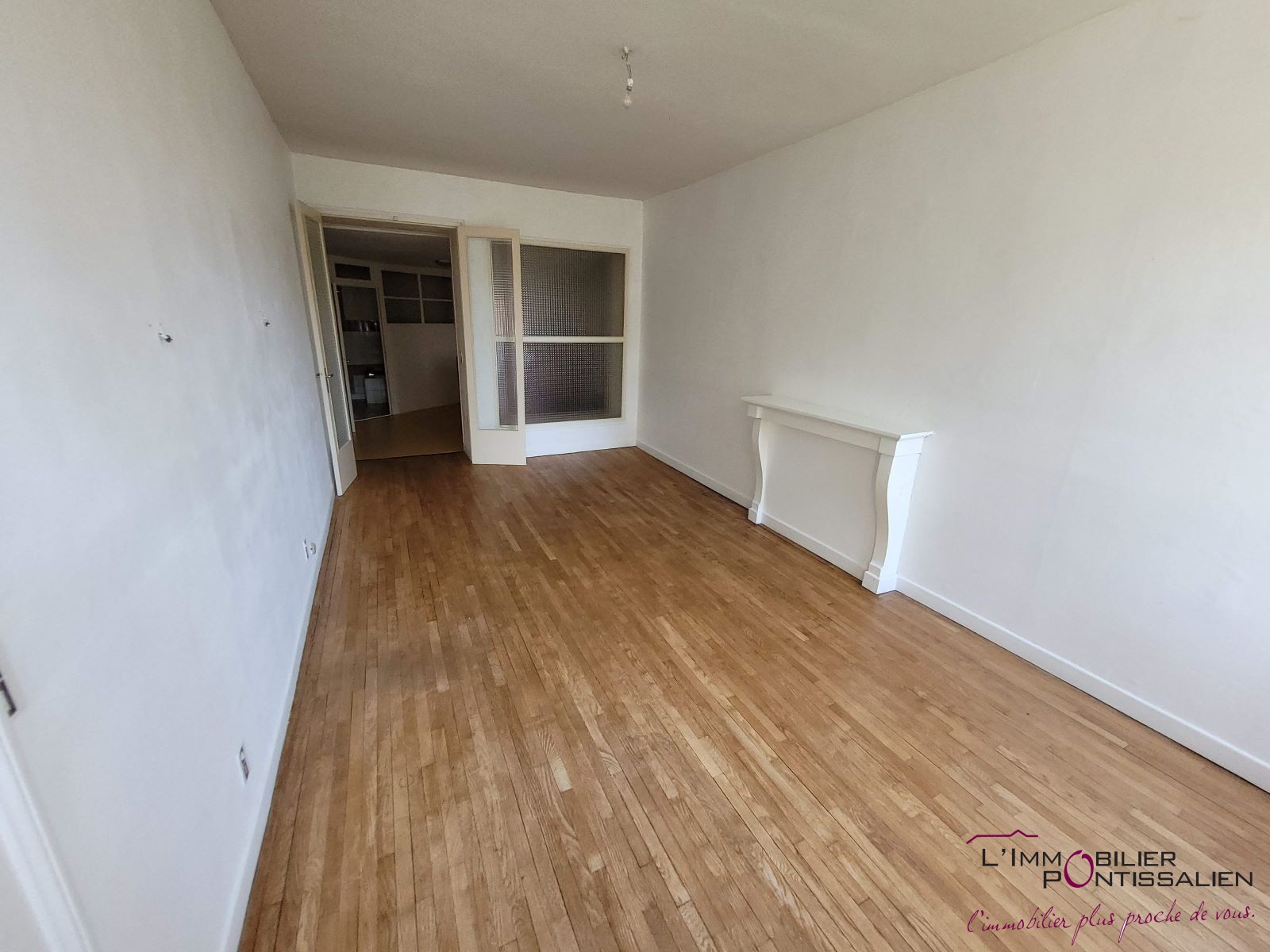 PONTARLIER - HYPER CENTRE : APPARTEMENT DE CARACTERE DE TYPE 3 A RENOVER AVEC JARDIN ET CAVE — photo 4