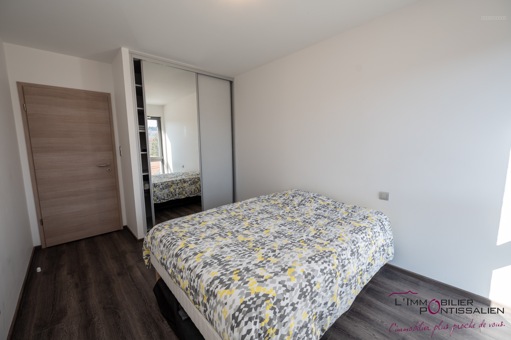 PONTARLIER - PROCHE CENTRE VILLE : APPARTEMENT RECENT DE TYPE 2 AVEC ASCENSEUR, CAVE, GARAGE ET TERRASSE — photo 15