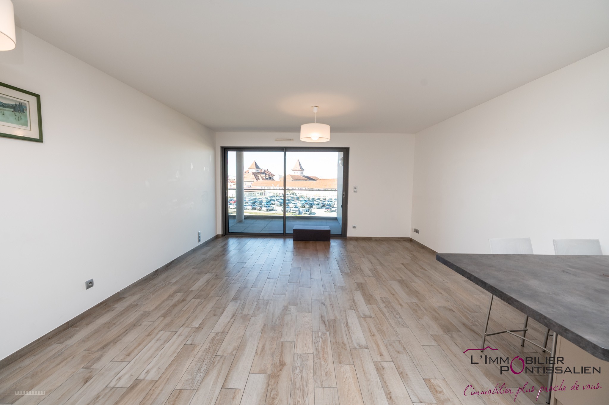 PONTARLIER - PROCHE CENTRE VILLE : APPARTEMENT RECENT DE TYPE 2 AVEC ASCENSEUR, CAVE, GARAGE ET TERRASSE — photo 6