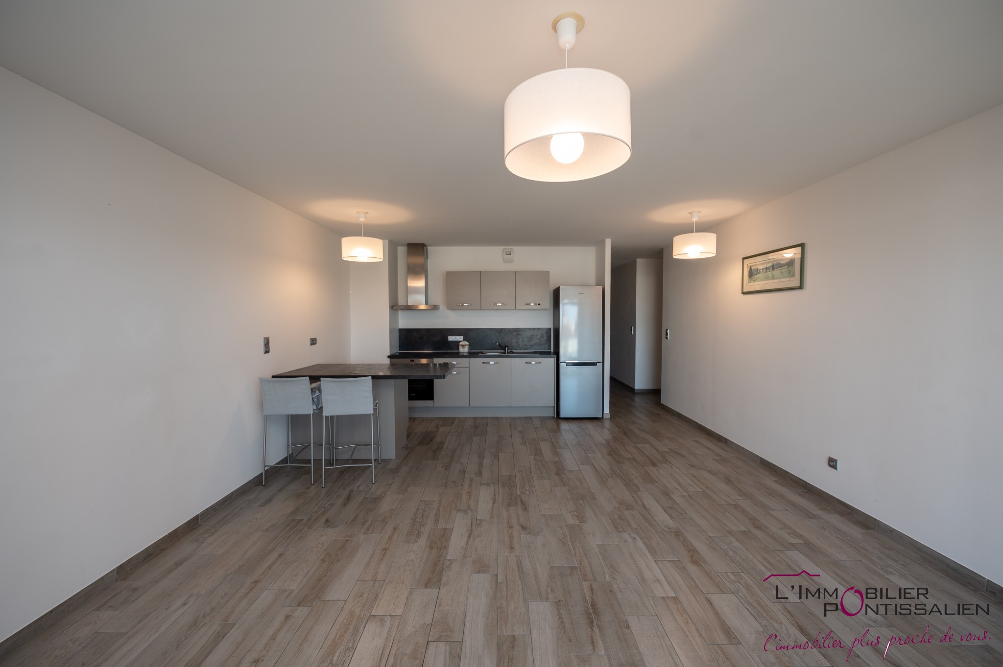 PONTARLIER - PROCHE CENTRE VILLE : APPARTEMENT RECENT DE TYPE 2 AVEC ASCENSEUR, CAVE, GARAGE ET TERRASSE — photo 8