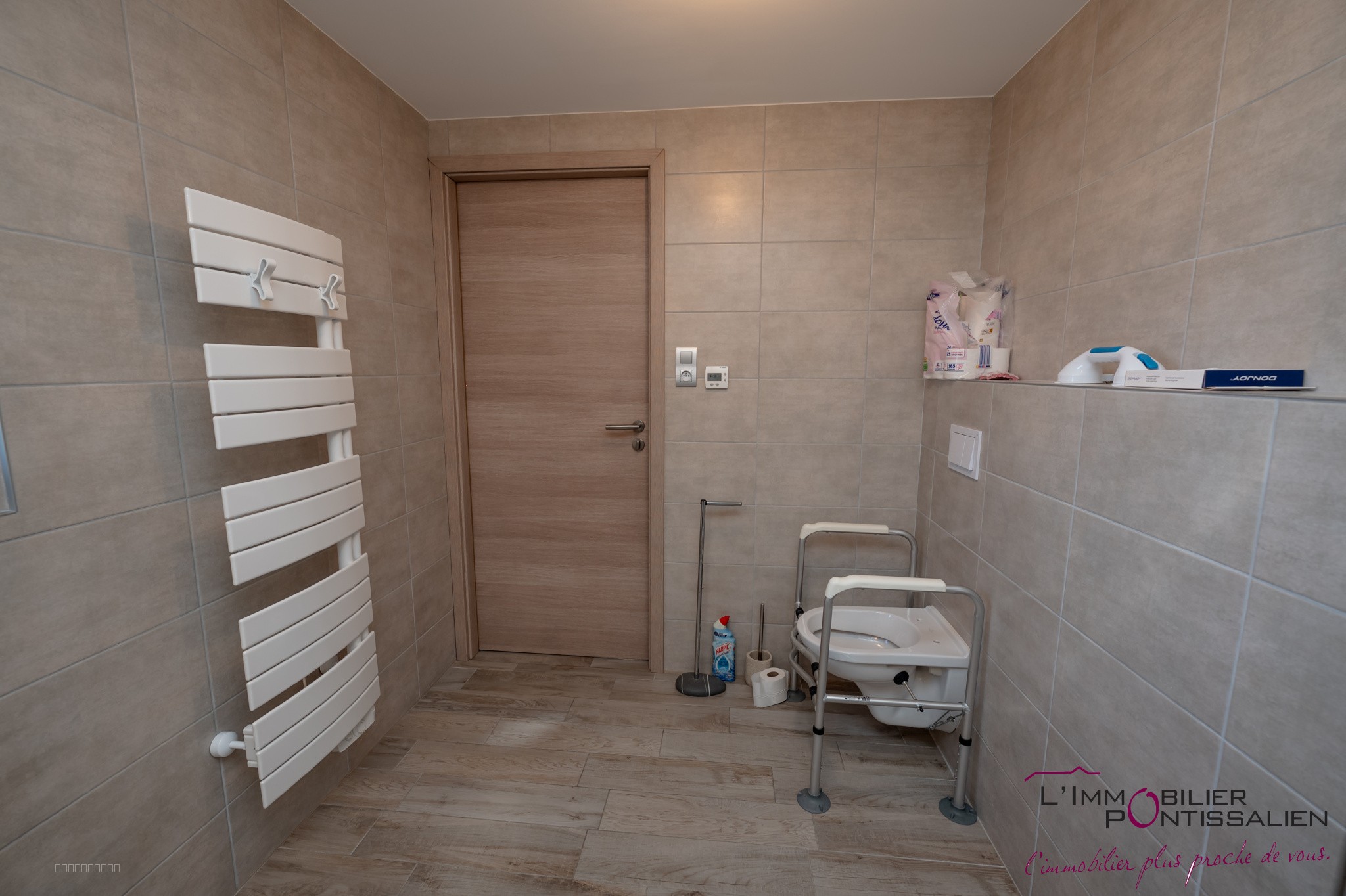 PONTARLIER - PROCHE CENTRE VILLE : APPARTEMENT RECENT DE TYPE 2 AVEC ASCENSEUR, CAVE, GARAGE ET TERRASSE — photo 14
