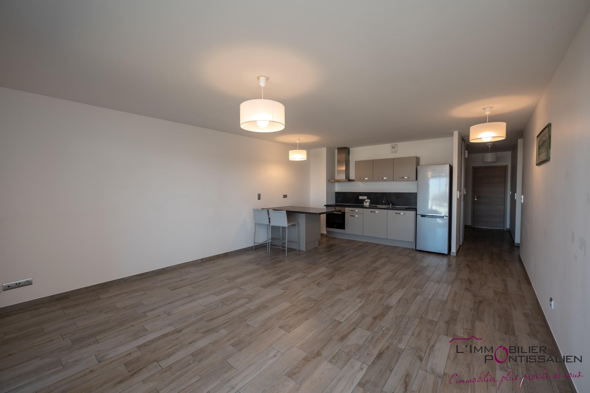 PONTARLIER - PROCHE CENTRE VILLE : APPARTEMENT RECENT DE TYPE 2 AVEC ASCENSEUR, CAVE, GARAGE ET TERRASSE — photo 9