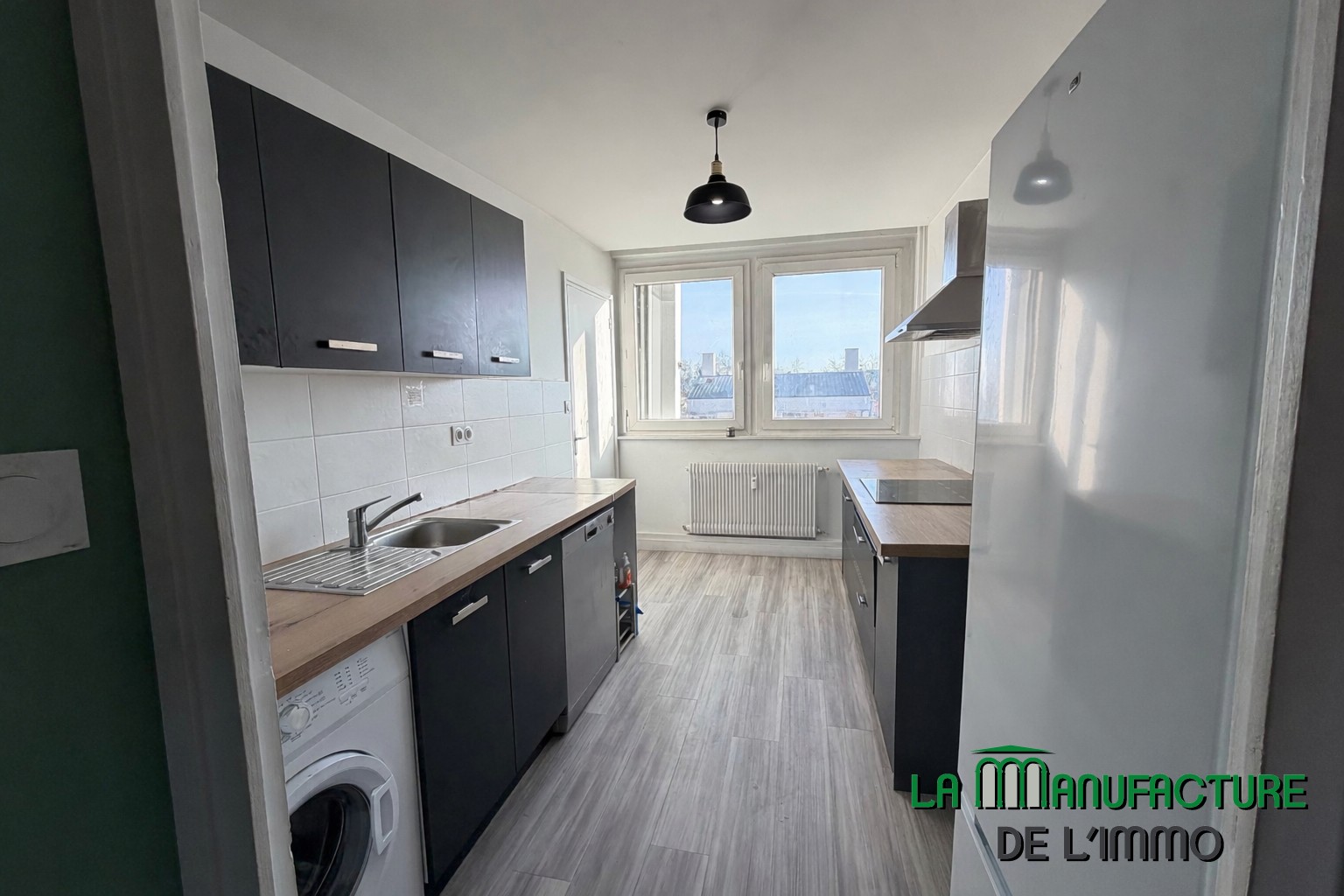 SAINT ETIENNE BERGSON - APPARTEMENT T3 72,06m2 AVEC 2 BALCONS + CAVE + GARAGE — photo 3