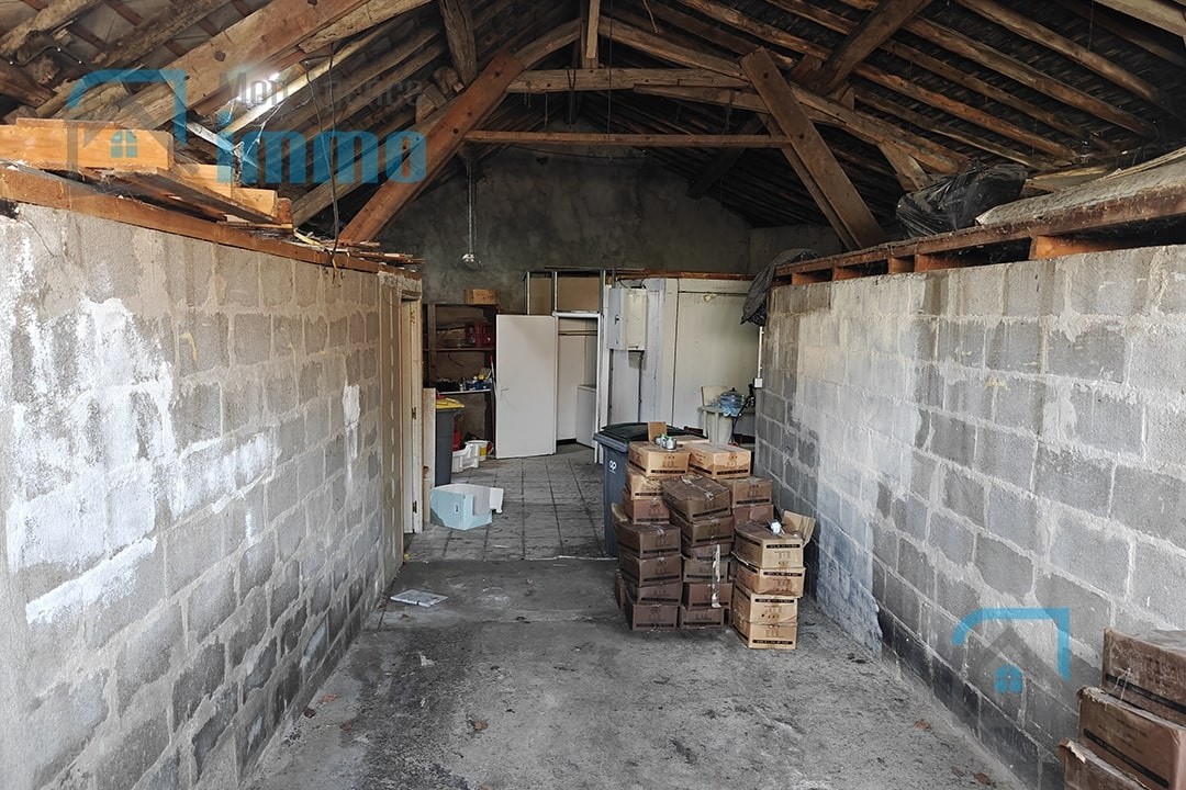 Mehun-sur-Yèvre   Immeuble à usage mixte (commercial et habitation) — photo 7