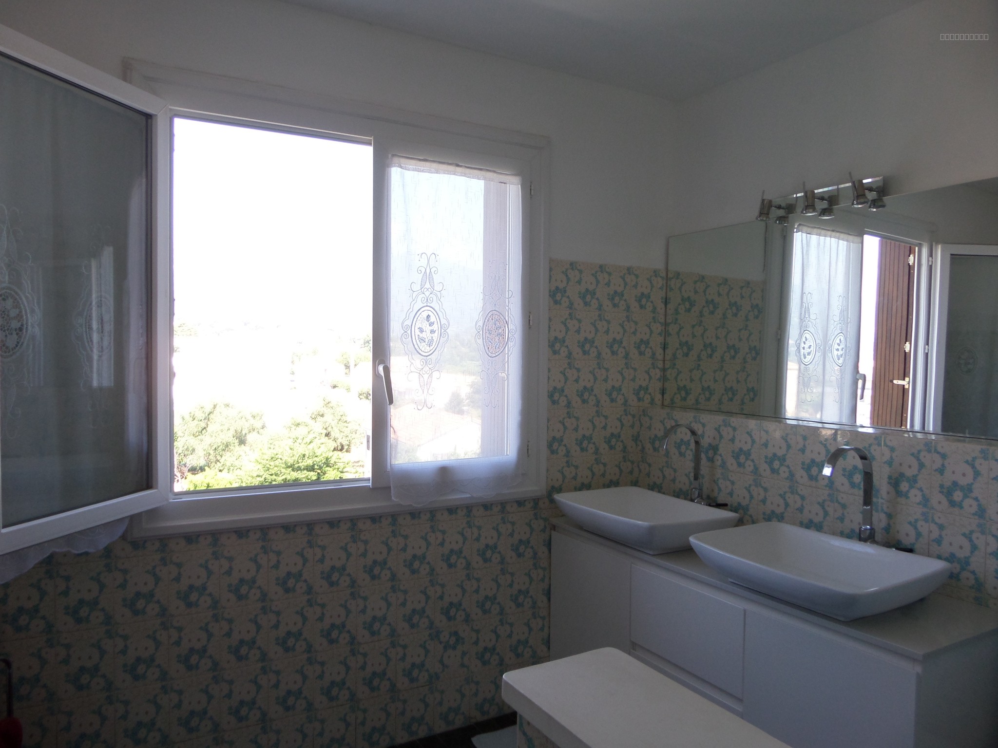 BEL APPARTEMENT VU MER ET MONTAGNE DE 90 M2 AVEC TERRASSE ET VERANDA A MORIANI PLAGE — photo 11