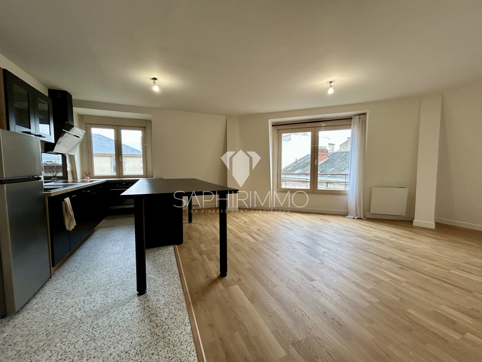 Appartement trois pièces - 60.23m2 - Centre-ville de Limoges — photo 2