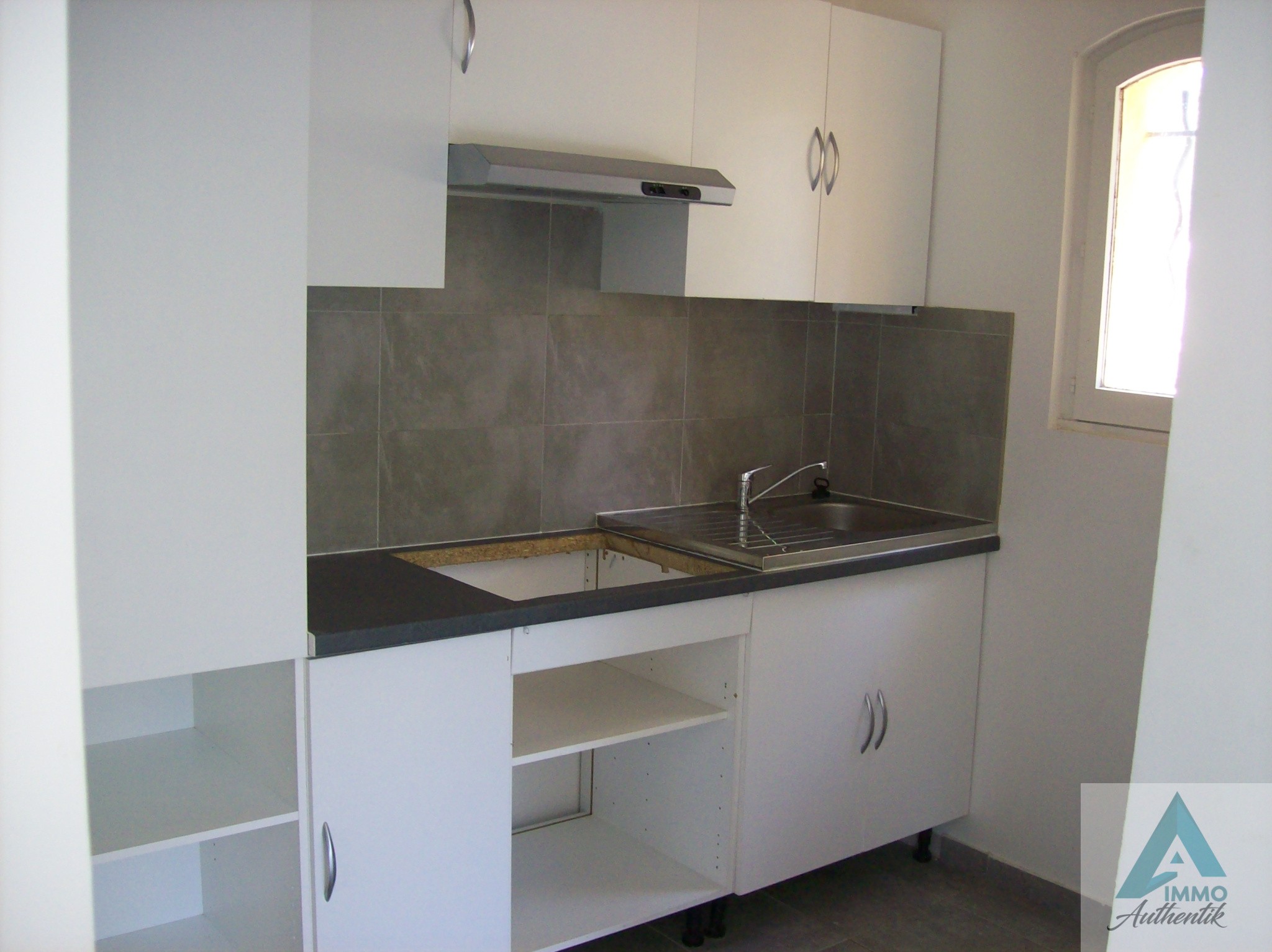 13112 LA DESTROUSSE APPARTEMENT 3PIECES STATIONNEMENT — photo 4