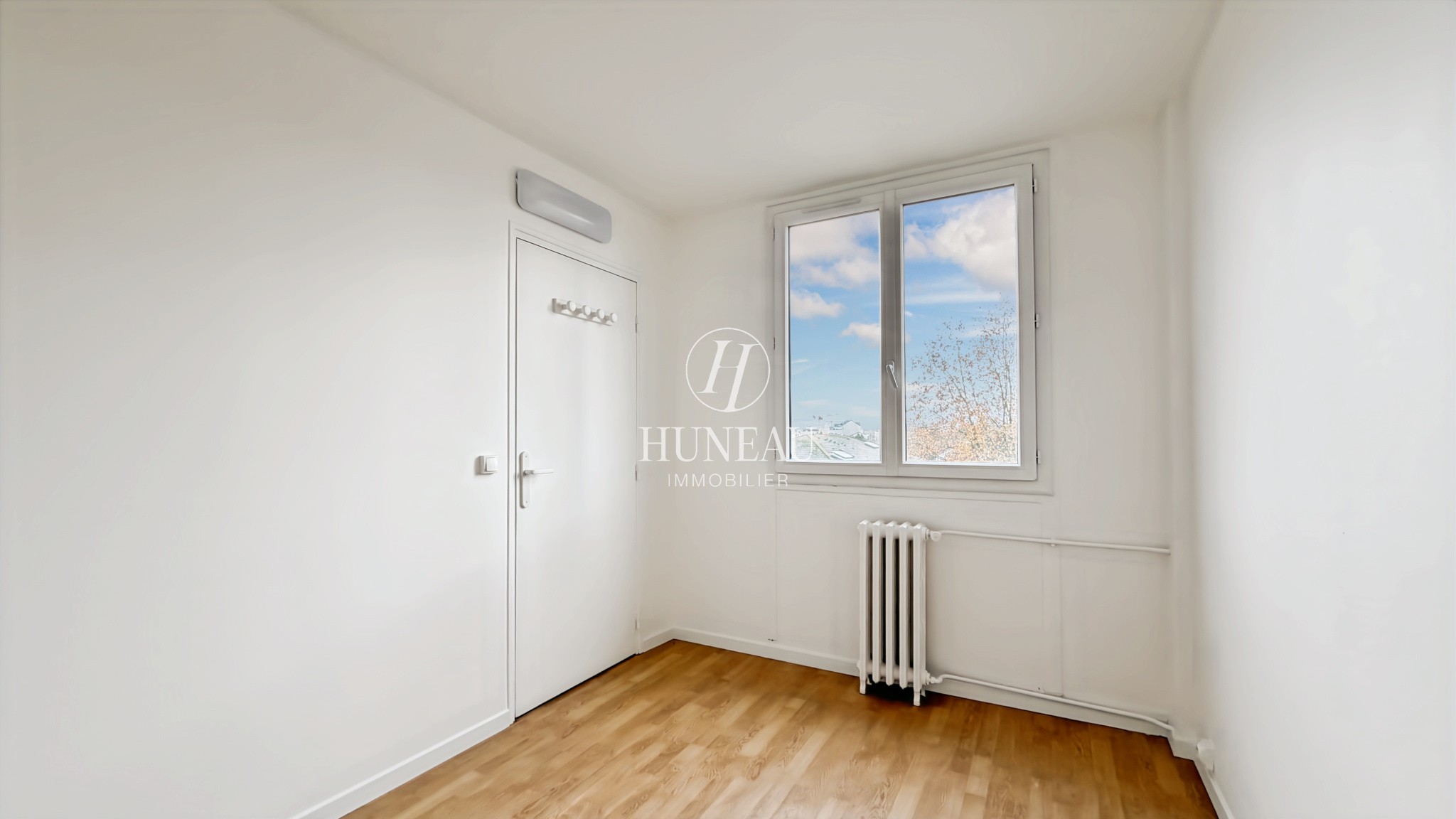 APPARTEMENT 4 PIÈCES LUMINEUX AVEC CAVE ET PARKING BOXE — photo 4