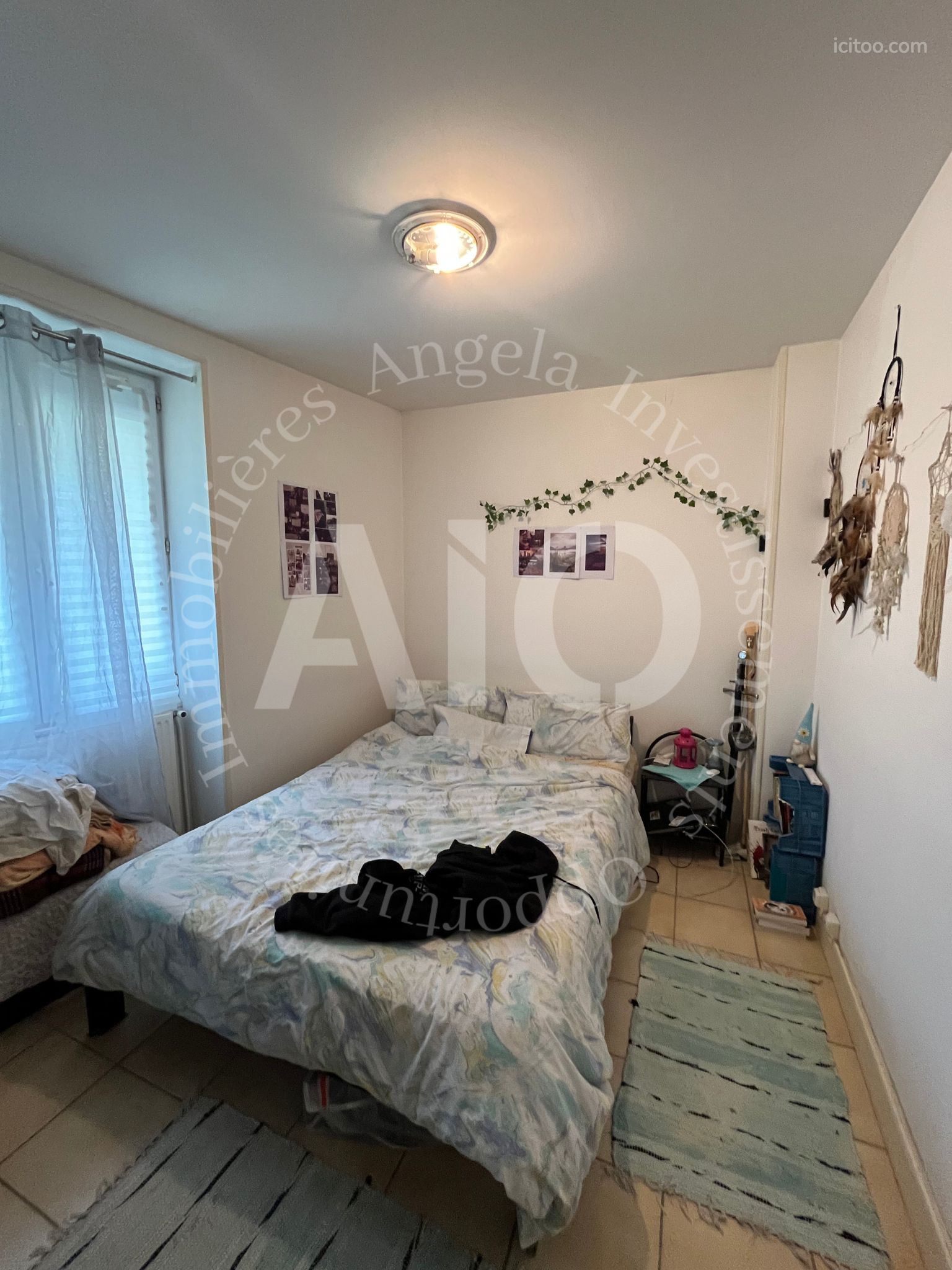 Cuisine aménagée et fonctionnelle d'un appartement T3 à vendre à Vindry-sur-Turdine.